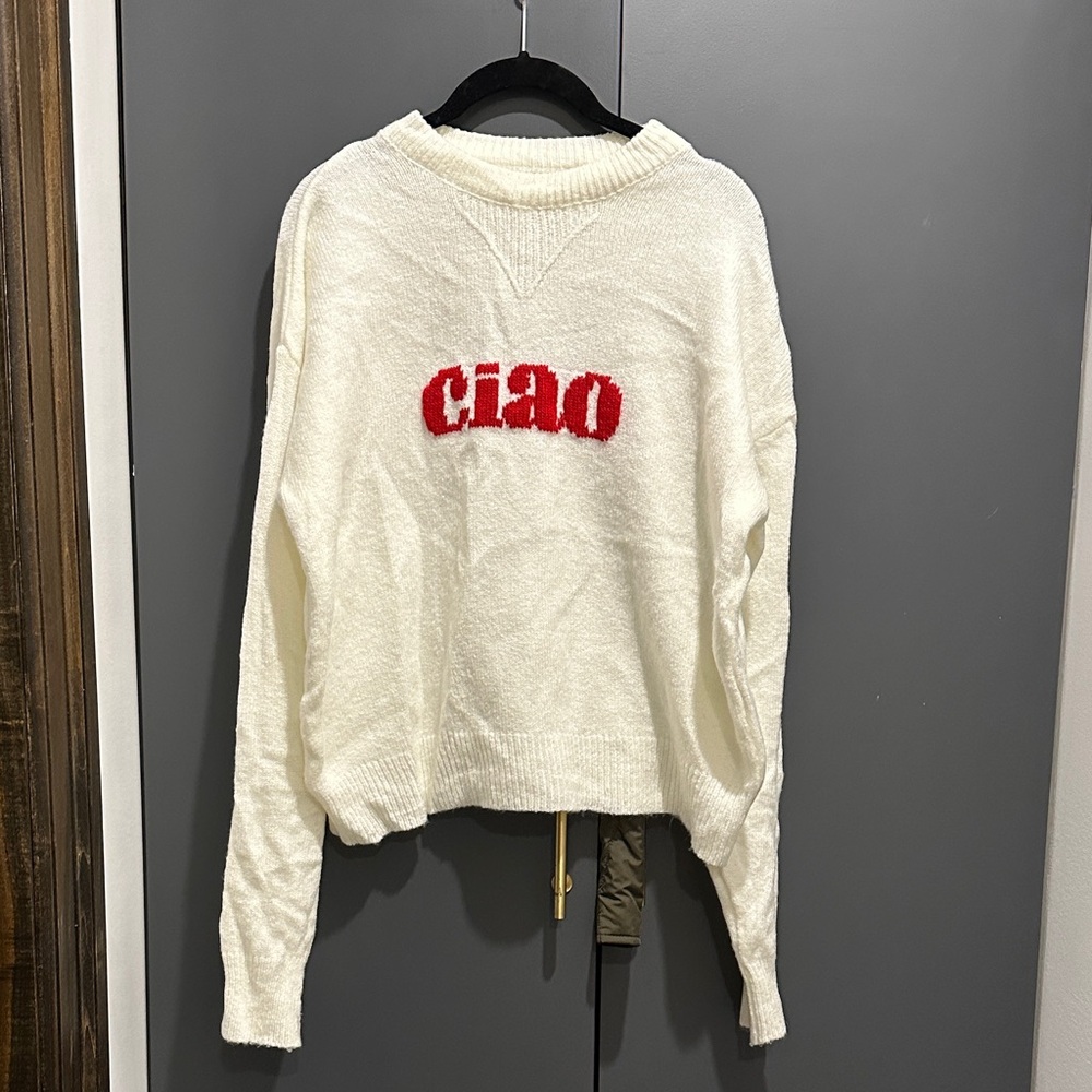 Trendy Boutique Cream Sweater with Red Accent